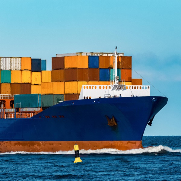 Cargo ship navigating the ocean, symbolizing efficient and reliable sea freight logistics.